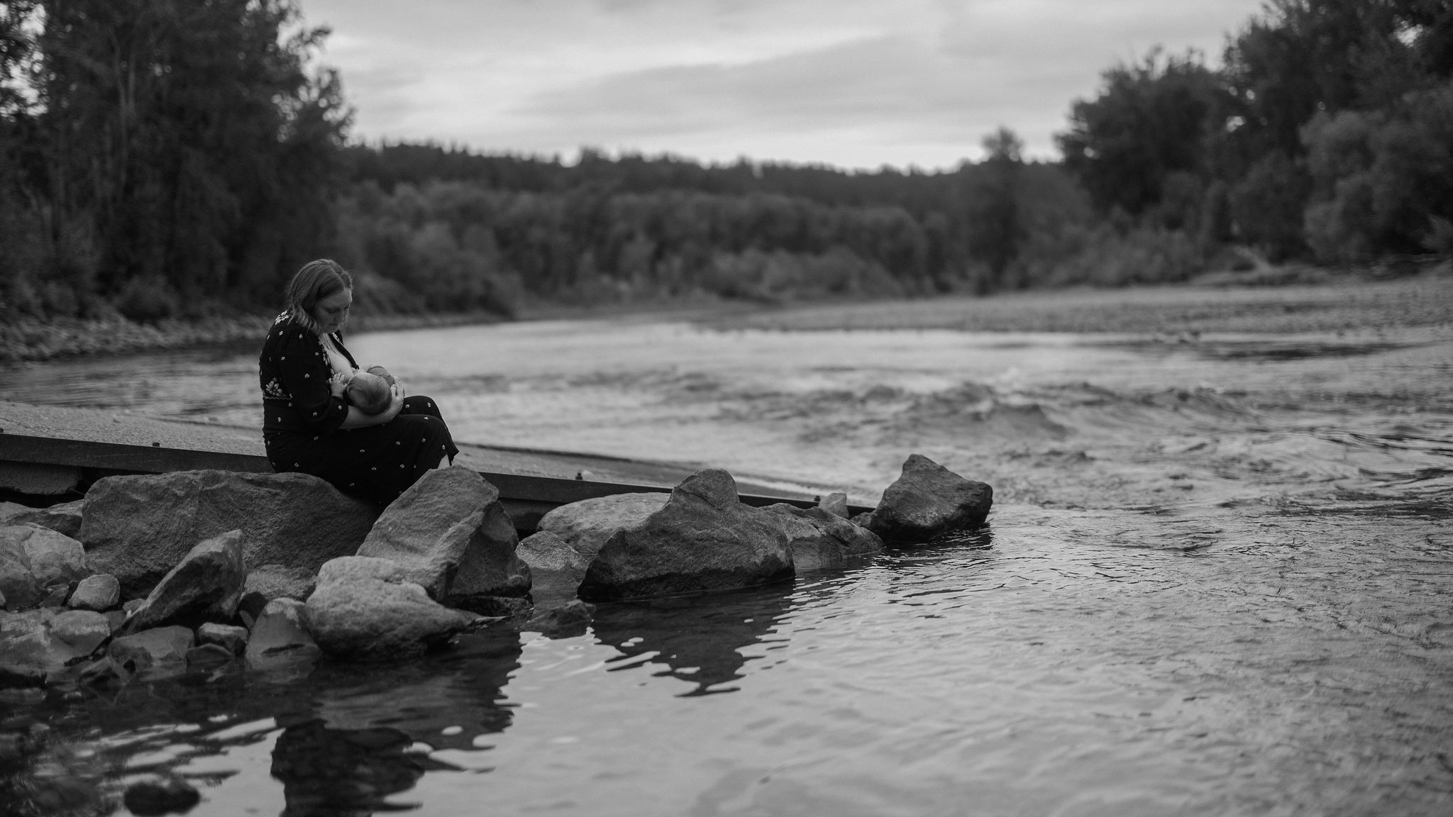 Lauren Joy, Portland doula, providing peaceful support by the riverside