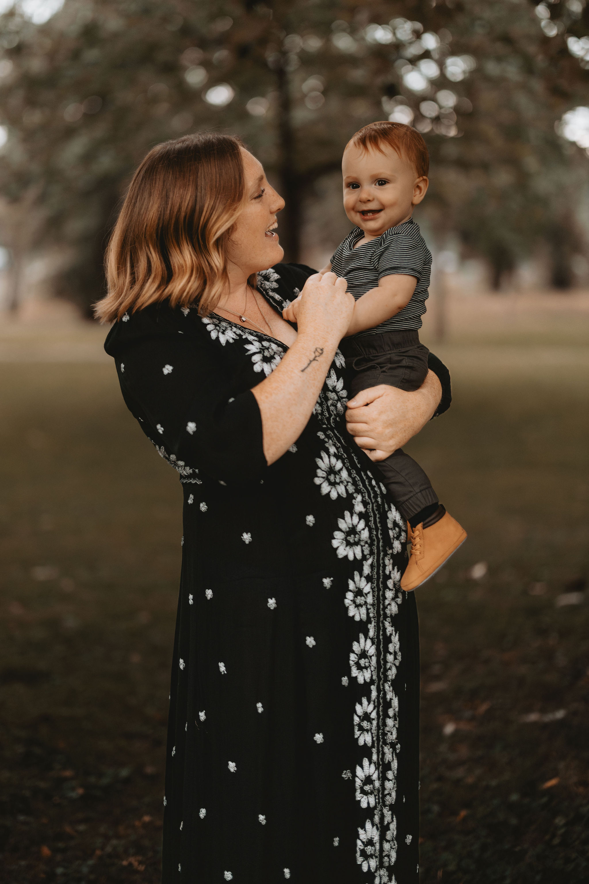 Lauren Joy, Portland birth doula, with her son in natural outdoor setting